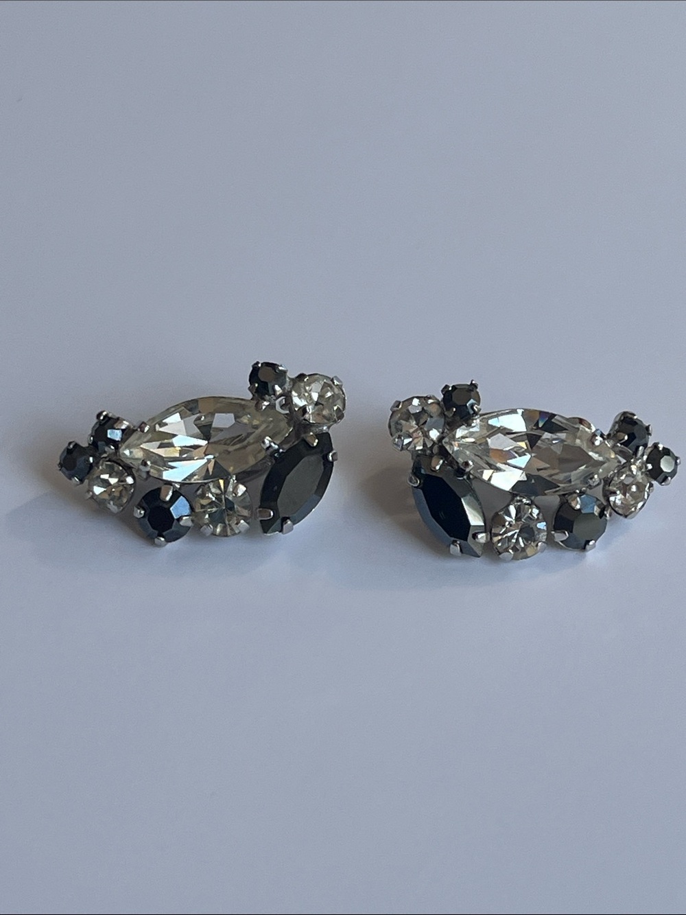 Signed Sherman Black Hematite-Tone Clear Rhinestone Clip-On Earrings